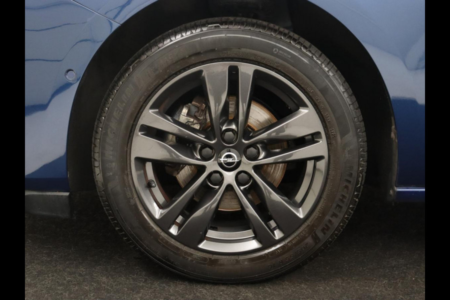 Opel Astra Sports Tourer 1.2 Design & Tech | Cruise control | Camera | Park assist | Trekhaak | Dodehoek detectie | Navigatie | Carplay | Climate control | 16" velgen