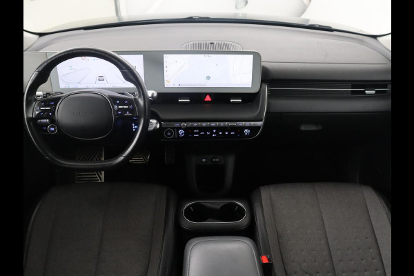 Hyundai IONIQ 5 Connect 77.4 kWh | SOH 94,1% | Half leder | Stuur/stoel verwarming Adaptive cruise | Trekhaak | BOSE sound | Camera | Park assist | Carplay | Climate control | Full LED