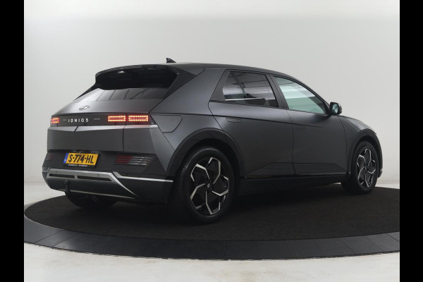 Hyundai IONIQ 5 Connect 77.4 kWh | SOH 94,1% | Half leder | Stuur/stoel verwarming Adaptive cruise | Trekhaak | BOSE sound | Camera | Park assist | Carplay | Climate control | Full LED