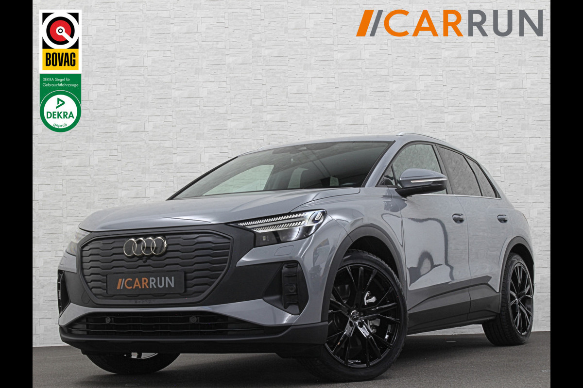 Audi Q4 e-tron 40 204pk 77 kWh | #RS-Leder | 96,7% SOH | 5x Q4 OP VOORRAAD! | ACC | Matrix-LED | Sfeerverlichting | 3 Zone Clima | Carplay | Getint Glas | Zwarte Hemelbekleding | Kieselgrau | Btw auto, 27150,= ex. | Bovag garantie. 4x Q4 op voorraad!