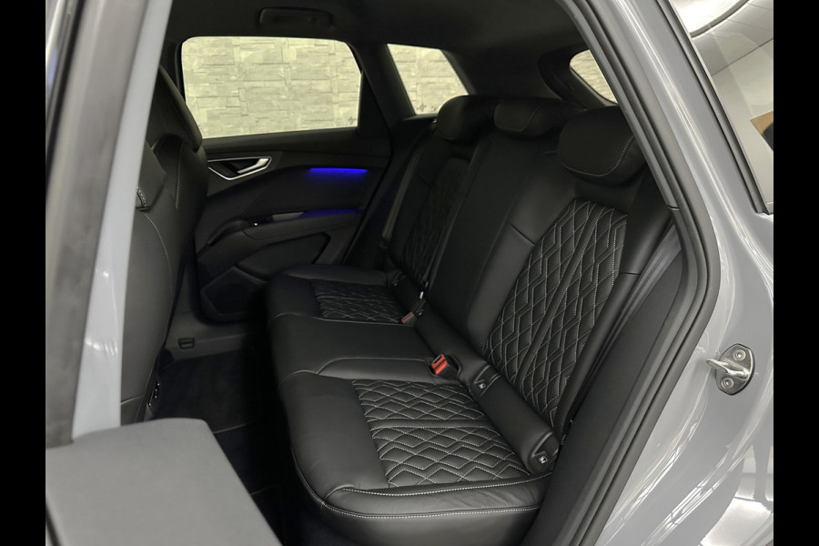 Audi Q4 e-tron 40 204pk 77 kWh | #RS-Leder | 96,7% SOH | 5x Q4 OP VOORRAAD! | ACC | Matrix-LED | Sfeerverlichting | 3 Zone Clima | Carplay | Getint Glas | Zwarte Hemelbekleding | Kieselgrau | Btw auto, 27150,= ex. | Bovag garantie. 4x Q4 op voorraad!