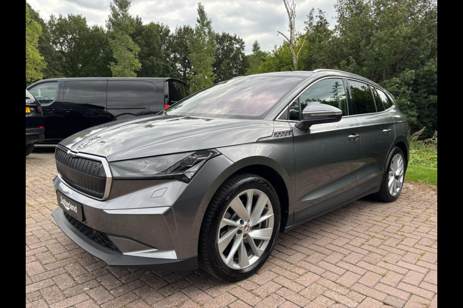 Škoda ENYAQ iV Business Edition 80 Design Selection Suite 204PK | SOH 94% | Wegklapbare Trekhaak | Warmtepomp | Navigatie | 360-Graden Camera | 20" LMV | Elektr. Klep