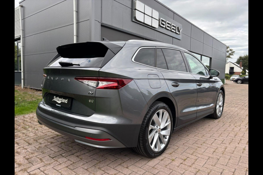 Škoda ENYAQ iV Business Edition 80 Design Selection Suite 204PK | SOH 94% | Wegklapbare Trekhaak | Warmtepomp | Navigatie | 360-Graden Camera | 20" LMV | Elektr. Klep