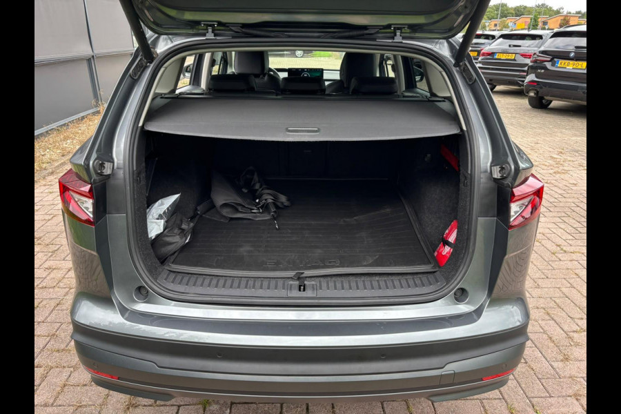 Škoda ENYAQ iV Business Edition 80 Design Selection Suite 204PK | SOH 94% | Wegklapbare Trekhaak | Warmtepomp | Navigatie | 360-Graden Camera | 20" LMV | Elektr. Klep