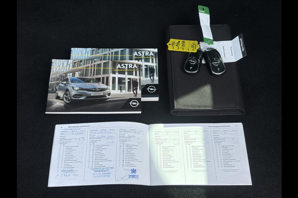 Opel Astra Sports Tourer 1.2 Ultimate ✓146pk✓Carplay✓Camera✓Stoelverw✓Stuurverw✓Keyless✓Pdc V+A✓Alcantara-Leder✓Clima✓Cruise✓6 Bak✓Rijstrooksensor✓Dodehoeksensor✓17''Lm velgen✓N.A.P✓Apk tot 11-2028
