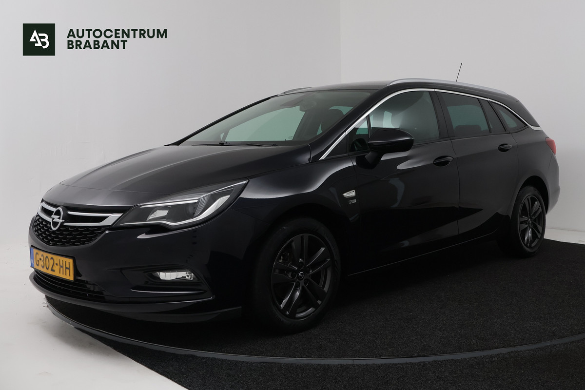 Opel Astra Sports Tourer 1.4 Turbo 120 Jaar Edition (NAVIGATIE, CRUISE CONTROL, PARKEERSENSOREN)