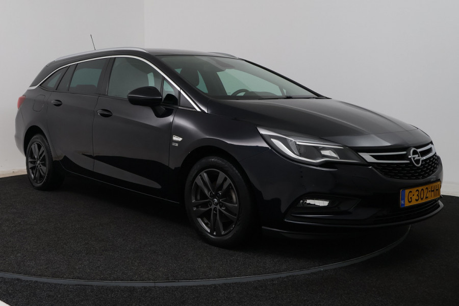 Opel Astra Sports Tourer 1.4 Turbo 120 Jaar Edition (NAVIGATIE, CRUISE CONTROL, PARKEERSENSOREN)
