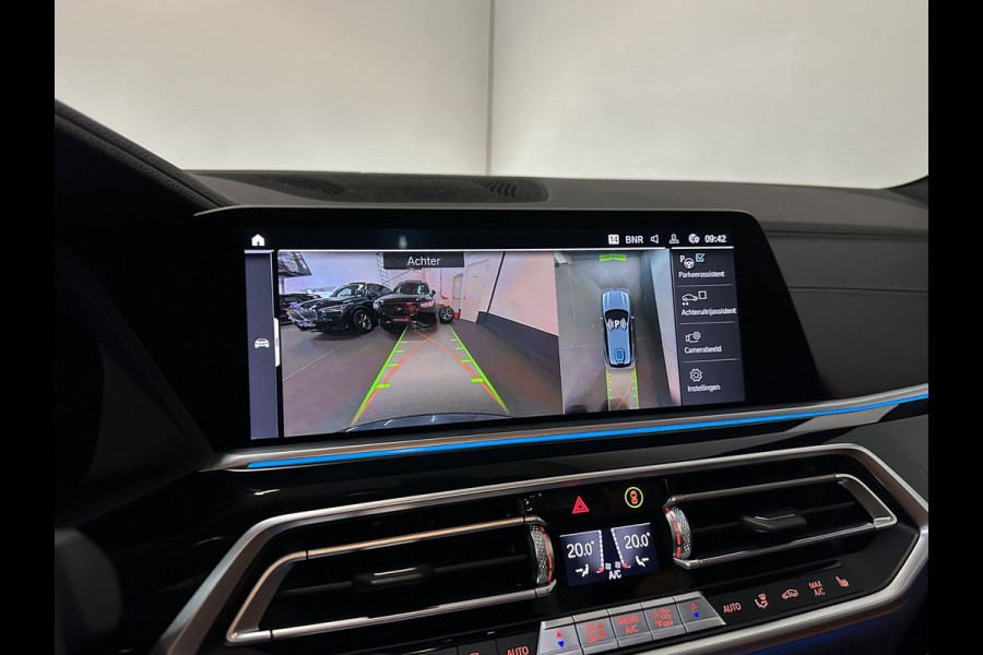 BMW X5 45e M-Performance Seats | 360 View | Panorama | ACC | Kristal pook | Head-Up | Laser-LED | Memory | Harman-Kardon | Keyless-Go | Trekhaak | Drive Assist Pro. | Leder | 4-Zone Clima | Standkachel | Rijklaarprijs & Bovag garantie | Carplay | Draadloos Laden | DAB | Sfeerverlichting |