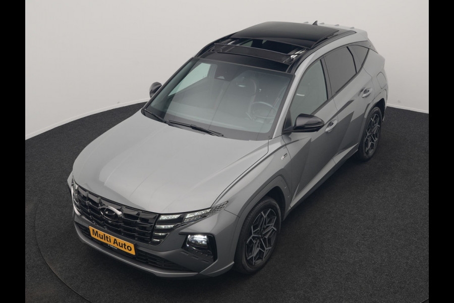 Hyundai Tucson 1.6 T-GDI N Line 4WD PHEV 265pk Dealer O.H | Panodak | Trekhaak Afn. | Adaptive Cruise | 360 Camera | Alcantara Sportstoelen Memory & Ventilatie | Stoelen & Stuur Verwarmd | Krell Audio | Carplay | Blis | Keyless | Navigatie | DAB | 19"L.M | Plug In Hybrid