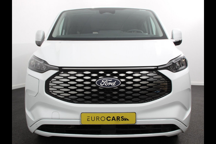Ford E-Transit Custom 340 L2H1 Limited 65 kWh 8 persoons Adaptieve cruise control Airco Lichtmetalen Velgen Extra getint glas Camera Navigatie Apple Carplay/ Android Auto