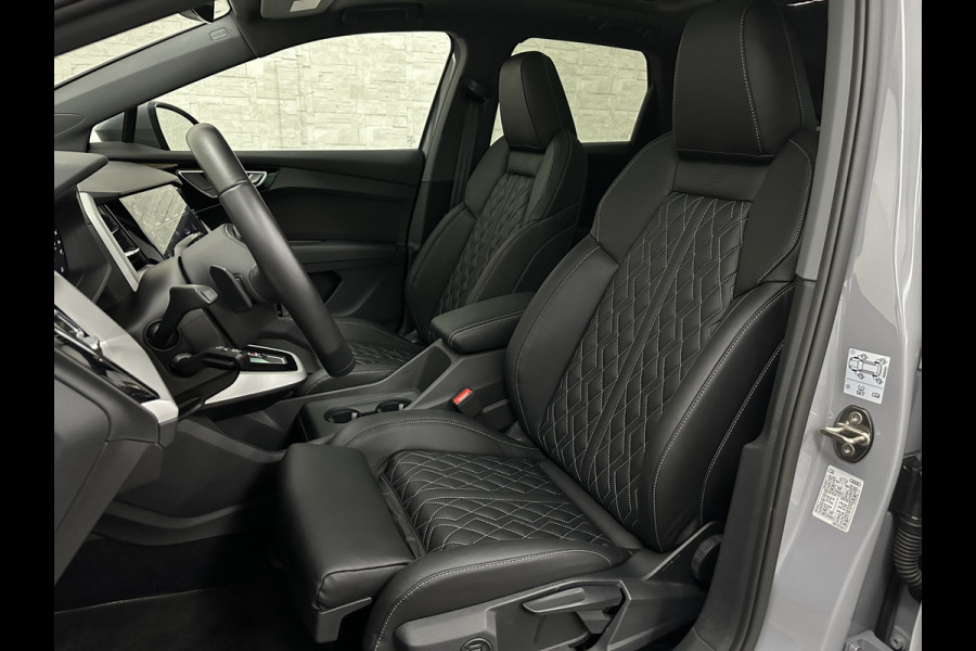 Audi Q4 e-tron 40 S-Line 77 kWh | Panorama | #RS-Leder | Warmtepomp | Sportstoelen | ACC | Lane Ass. | 5x Q4 op voorraad! | MMi+ | Virtual-Cockpit | 3-Zone Climate Control | Getint Glas | Zwarte Hemel | Elktr. A klep | Kieselgrijs | Btw Auto.
