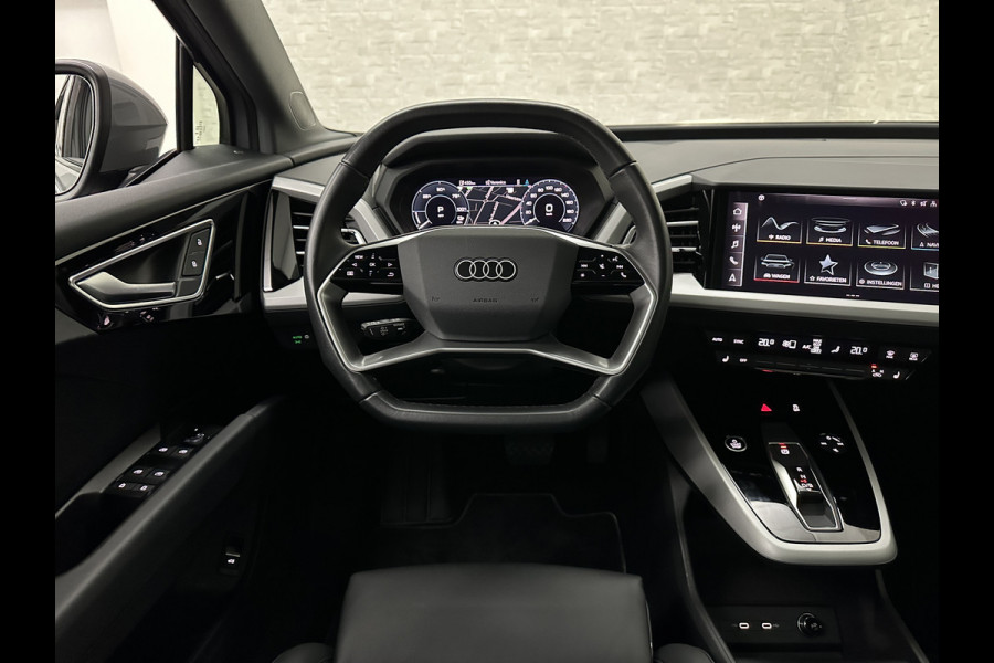 Audi Q4 e-tron 40 S-Line 77 kWh | Panorama | #RS-Leder | Warmtepomp | Sportstoelen | ACC | Lane Ass. | 5x Q4 op voorraad! | MMi+ | Virtual-Cockpit | 3-Zone Climate Control | Getint Glas | Zwarte Hemel | Elktr. A klep | Kieselgrijs | Btw Auto.