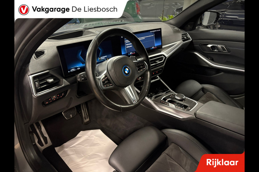 BMW 3 Serie Touring 330e xDrive M-pakket facelift / Panorama-dak / head-up / 360 camera / Harman-Kardon