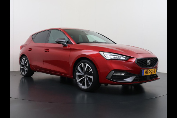 Seat Leon 1.5 eTSI FR VAN:22.900,- VOOR:19.877,- UW HERFSTVOORDEEL:3.023,- 150PK | STOEL + STUURVERWARMING |ACHTERUIT RIJ CAMERA | KEYLESS | DODEHOEK | APPLECARPLAY\AINDROID AUTO | TREKHAAK | RIJKLAAR GELEVERD MET 12 MND BOVAG GARANTIE | ADAP. CRUISE |