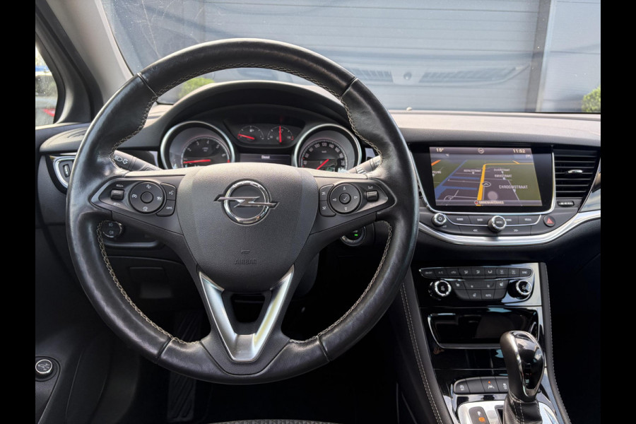 Opel Astra Sports Tourer 1.4 Business Executive ✓2 Eigenaar✓Camera✓Navi✓Trekhaakt✓Carplay✓Stoelverw✓Stuurverw✓Automaat✓Dealer Onderhouden✓Keyless✓Clima✓Cruise✓Pdc V+A✓Halfleder✓Comfortstoelen✓150pk✓Rijstrooksensor✓Dodehoeksensor✓Elekt Stoelen✓Lm velgen✓N.A.P✓Apk tot 03-2027