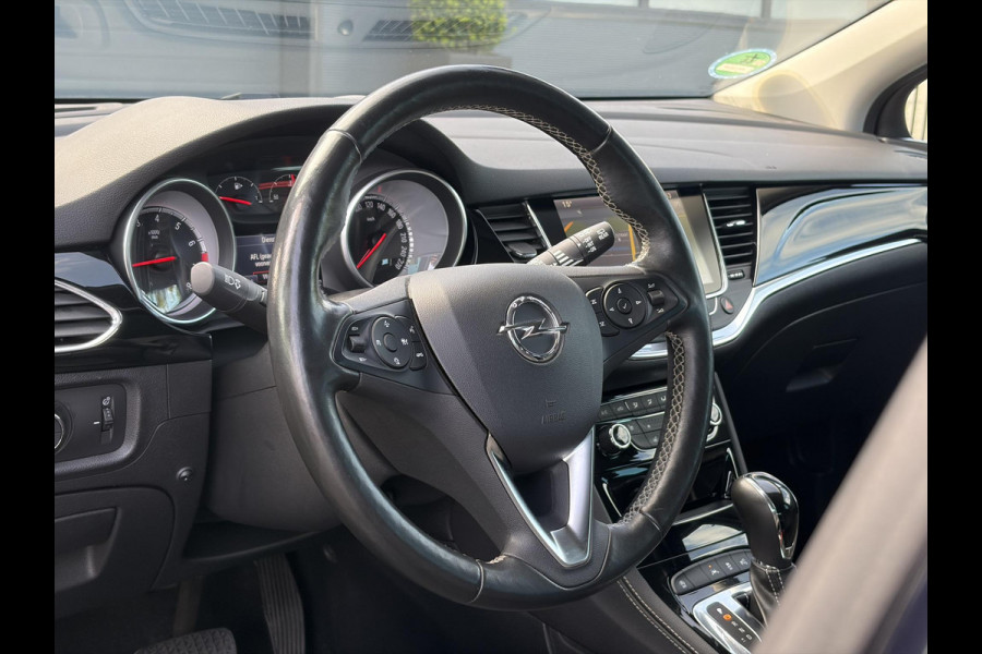 Opel Astra Sports Tourer 1.4 Business Executive ✓2 Eigenaar✓Camera✓Navi✓Trekhaakt✓Carplay✓Stoelverw✓Stuurverw✓Automaat✓Dealer Onderhouden✓Keyless✓Clima✓Cruise✓Pdc V+A✓Halfleder✓Comfortstoelen✓150pk✓Rijstrooksensor✓Dodehoeksensor✓Elekt Stoelen✓Lm velgen✓N.A.P✓Apk tot 03-2027