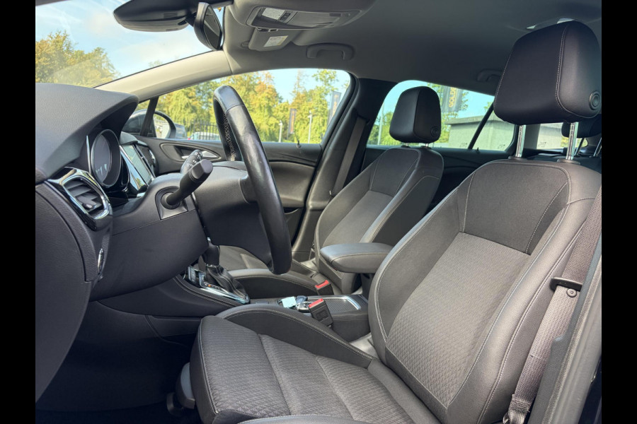 Opel Astra Sports Tourer 1.4 Business Executive ✓2 Eigenaar✓Camera✓Navi✓Trekhaakt✓Carplay✓Stoelverw✓Stuurverw✓Automaat✓Dealer Onderhouden✓Keyless✓Clima✓Cruise✓Pdc V+A✓Halfleder✓Comfortstoelen✓150pk✓Rijstrooksensor✓Dodehoeksensor✓Elekt Stoelen✓Lm velgen✓N.A.P✓Apk tot 03-2027