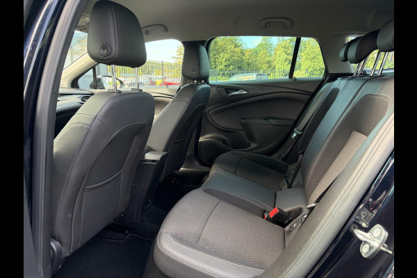 Opel Astra Sports Tourer 1.4 Business Executive ✓2 Eigenaar✓Camera✓Navi✓Trekhaakt✓Carplay✓Stoelverw✓Stuurverw✓Automaat✓Dealer Onderhouden✓Keyless✓Clima✓Cruise✓Pdc V+A✓Halfleder✓Comfortstoelen✓150pk✓Rijstrooksensor✓Dodehoeksensor✓Elekt Stoelen✓Lm velgen✓N.A.P✓Apk tot 03-2027