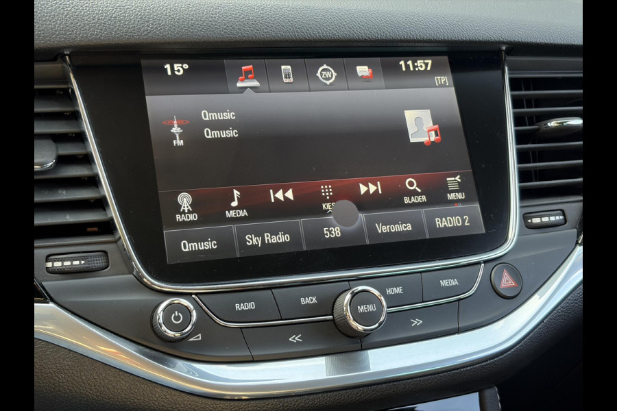 Opel Astra Sports Tourer 1.4 Business Executive ✓2 Eigenaar✓Camera✓Navi✓Trekhaakt✓Carplay✓Stoelverw✓Stuurverw✓Automaat✓Dealer Onderhouden✓Keyless✓Clima✓Cruise✓Pdc V+A✓Halfleder✓Comfortstoelen✓150pk✓Rijstrooksensor✓Dodehoeksensor✓Elekt Stoelen✓Lm velgen✓N.A.P✓Apk tot 03-2027