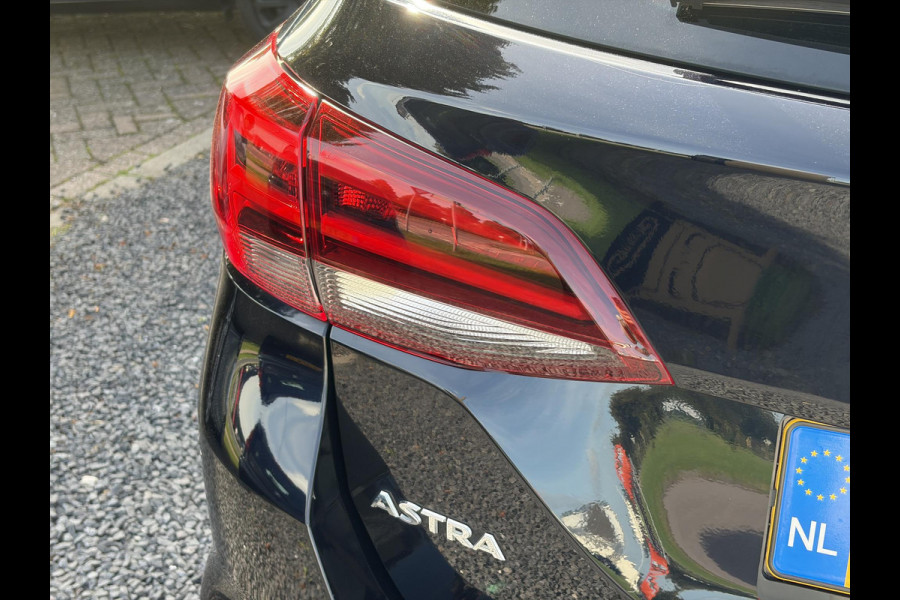 Opel Astra Sports Tourer 1.4 Business Executive ✓2 Eigenaar✓Camera✓Navi✓Trekhaakt✓Carplay✓Stoelverw✓Stuurverw✓Automaat✓Dealer Onderhouden✓Keyless✓Clima✓Cruise✓Pdc V+A✓Halfleder✓Comfortstoelen✓150pk✓Rijstrooksensor✓Dodehoeksensor✓Elekt Stoelen✓Lm velgen✓N.A.P✓Apk tot 03-2027