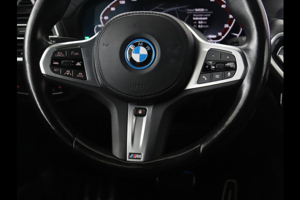 BMW iX3 Executive 80 kWh M-Sport | SOH 94.4% | Panoramadak | Leder | Adaptive cruise | Trekhaak | Carplay | Sfeerverlichting | Memory | Stuur/stoelverwarming | Camera | Park assist |