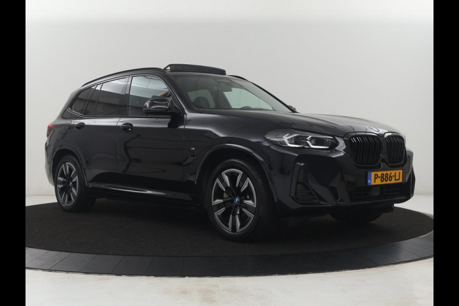 BMW iX3 Executive 80 kWh M-Sport | SOH 94.4% | Panoramadak | Leder | Adaptive cruise | Trekhaak | Carplay | Sfeerverlichting | Memory | Stuur/stoelverwarming | Camera | Park assist |