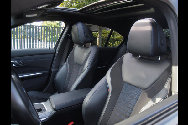 BMW 3 Serie 318i Business Edition | M-Pakket | Panoramadak | Trekhaak | Camera | Sfeerverlichting | Sportstoelen | NL-Auto |
