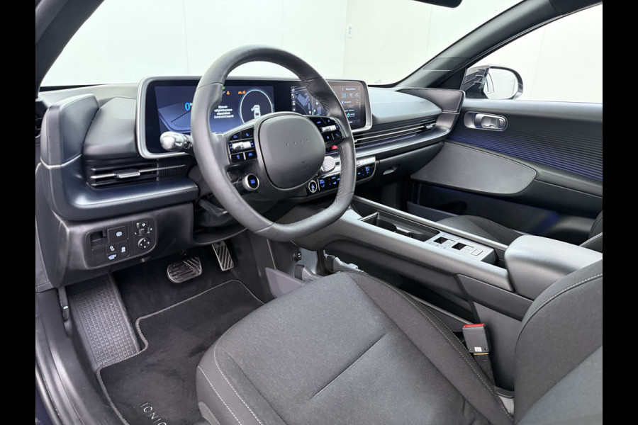 Hyundai IONIQ 6 77.4kWh 229PK Trekhaak SOH 100% Warmtepomp Adap.Cruise Head-Up Stoel+Achterbank+Stuur Verwarming Camera Navi Pdc Apple Carplay A Elek. Achterklep Privacy Glas Lmv Led Lane Assist 1.500KG Trekgewicht 1e Eigenaar Origineel Nederlandse Auto