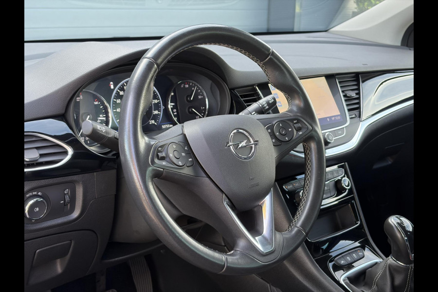 Opel Astra Sports Tourer 1.2 Business Elegance ✓1e Eigenaar✓110pk✓Carplay✓Camera✓Navi✓Clima✓Cruise✓Halfleder✓Comfortstoel✓Pdc V+A✓6 Bak✓Dealer Onderhouden✓Keyless✓Lm velgen✓N.A.P✓Apk tot 06-2027