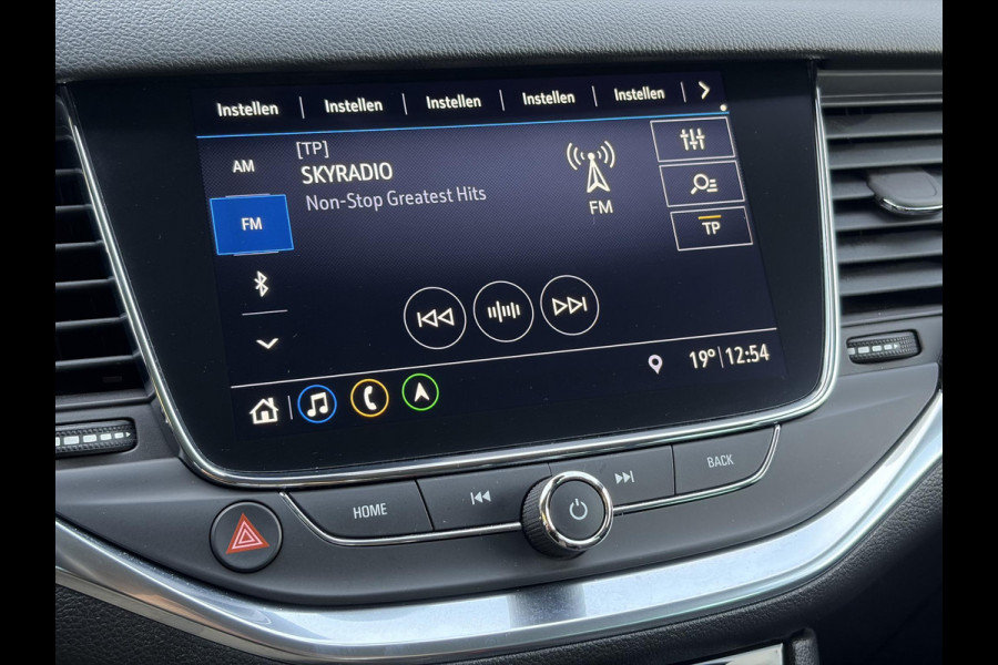 Opel Astra Sports Tourer 1.2 Business Elegance ✓1e Eigenaar✓110pk✓Carplay✓Camera✓Navi✓Clima✓Cruise✓Halfleder✓Comfortstoel✓Pdc V+A✓6 Bak✓Dealer Onderhouden✓Keyless✓Lm velgen✓N.A.P✓Apk tot 06-2027