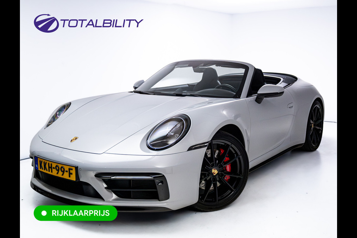 Porsche 911 Cabrio 3.0 Carrera S 451 PK | Sportdesign zwart | Sportuitlaat | Sport Chrono | Stoel verw. & ventilatie | Porsche approved gara Stuurbekr. plus, PASM, PTV Plus, Kl. 3 & 5 alarm, Sportstoelen plus, Ambienteverl., Leer pakket, Ijsgrijs metallic