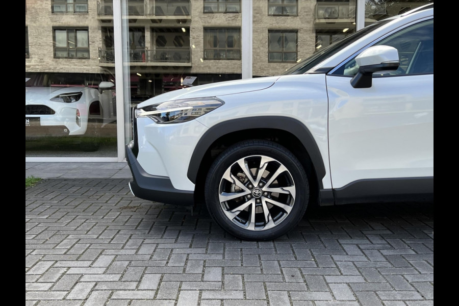 Toyota Corolla Cross 140 Hybrid Dynamic | Trekhaak, Parelmoer wit, Dodehoekherkenning, Parkeersensoren, Stoel + Stuurverwarming
