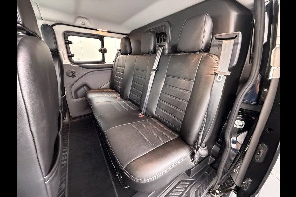 Ford Transit Custom 320 2.0TDCI 170PK Automaat L2H1 Dubbele Cabine 2X Schuifdeur Adap.Cruise 5-Persoons Leder+Verwarmd Trekhaak Navi Camera Pdc Appl Euro 6 Lmv 18" Sidebars Betonplex Vloer Wandbetimmering Lane Assist 3.200KG Trekgewicht