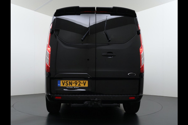 Ford Transit Custom 320 2.0TDCI 170PK Automaat L2H1 Dubbele Cabine 2X Schuifdeur Adap.Cruise 5-Persoons Leder+Verwarmd Trekhaak Navi Camera Pdc Appl Euro 6 Lmv 18" Sidebars Betonplex Vloer Wandbetimmering Lane Assist 3.200KG Trekgewicht