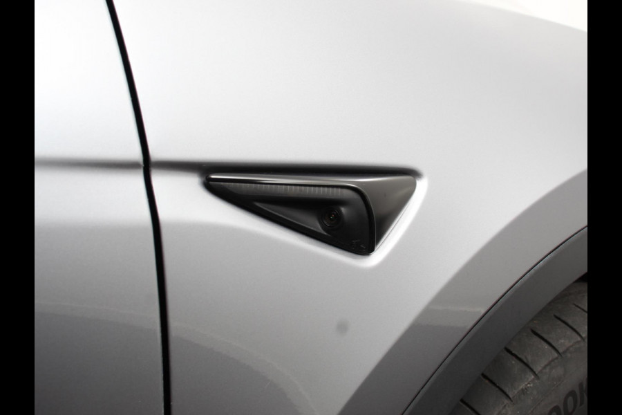Tesla Model Y Long Range AWD 75 kWh Climate control Adaptieve cruise control Achteruitrijcamera Panoramadak Keyless Stuurverwarming Stoelverwarming LED Navigatie Parkeersensoren
