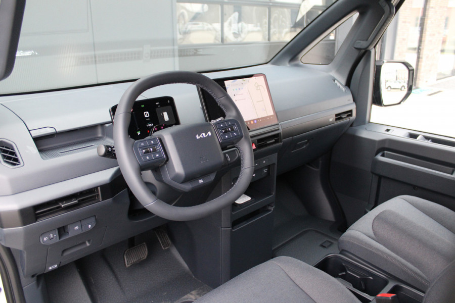 Kia PV5 L2H1 Plus 71.2 kWh 164pk - 416km WLTP - Stoel/Stuurverwarming - Keyless - V2L - Camera - ACC met stuurhulp - Rijklaar