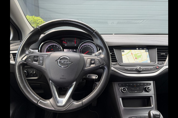 Opel Astra Sports Tourer 1.4 Turbo 120 Jaar Edition ✓150pk✓Carplay✓Navi✓Trekhaak✓Pdc V+A✓Clima✓Cruise✓6 Bak✓Lm velgen✓N.A.P✓Apk tot 02-2028