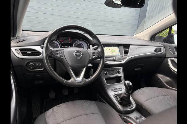 Opel Astra Sports Tourer 1.4 Turbo 120 Jaar Edition ✓150pk✓Carplay✓Navi✓Trekhaak✓Pdc V+A✓Clima✓Cruise✓6 Bak✓Lm velgen✓N.A.P✓Apk tot 02-2028