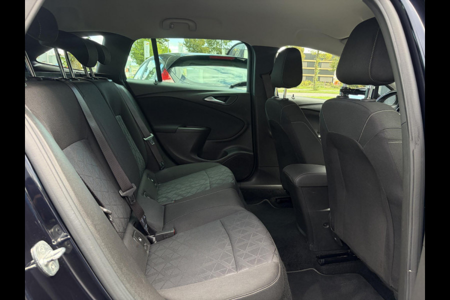 Opel Astra Sports Tourer 1.4 Turbo 120 Jaar Edition ✓150pk✓Carplay✓Navi✓Trekhaak✓Pdc V+A✓Clima✓Cruise✓6 Bak✓Lm velgen✓N.A.P✓Apk tot 02-2028