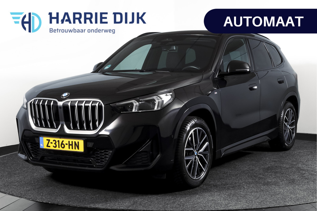 BMW X1 sDrive18i 136 PK | M-Sport | Afn. Trekhaak | Dig. Cockpit | Cruise | PDC | Camera | NAV + App. Connect | ECC | Elek. Klep | LM 18" |