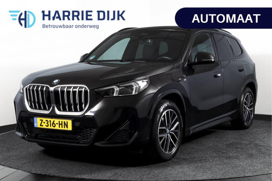 BMW X1 sDrive18i 136 PK | M-Sport | Afn. Trekhaak | Dig. Cockpit | Cruise | PDC | Camera | NAV + App. Connect | ECC | Elek. Klep | LM 18" |