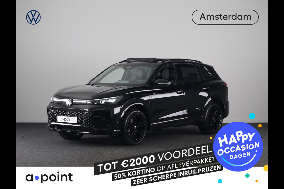 Volkswagen Tiguan 1.5 eHybrid R-Line Edition 272 pk Automaat (DSG) | Verlengde garantie | Navigatie | Panoramadak | Trekhaak (wegklapbaar) | Rondomzicht camera | Lederen bekleding |Stoelverwarming/ventilatie | R-Line |