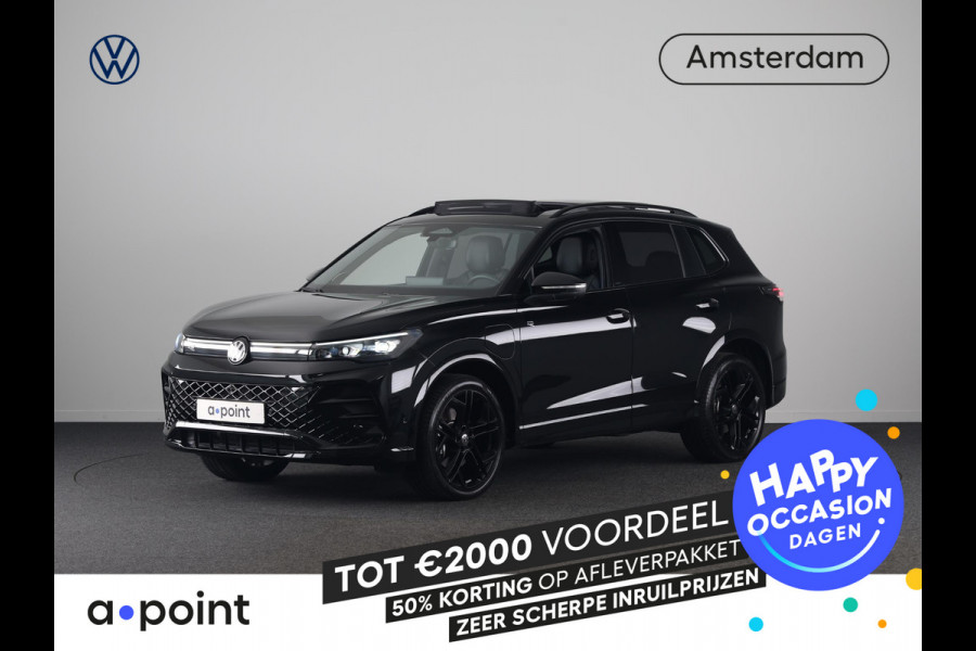 Volkswagen Tiguan 1.5 eHybrid R-Line Edition 272 pk Automaat (DSG) | Verlengde garantie | Navigatie | Panoramadak | Trekhaak (wegklapbaar) | Rondomzicht camera | Lederen bekleding |Stoelverwarming/ventilatie | R-Line |
