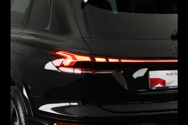 Audi Q6 e-tron S edition performance 100 kWh 306 pk | SOH 99,50% | Verlengde garantie | Navigatie | Warmetepomp | Panoramadak | Trekhaak (wegklapbaar) | Lederen bekleding | B&O Soundsystem | Rondomzicht camera | Head-up display | S-Line |