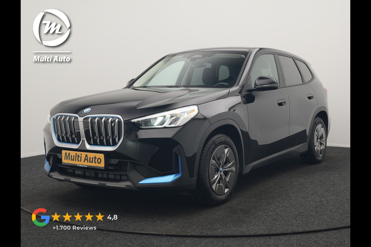 BMW iX1 xDrive30 67 kWh 313pk Dealer O.H. | Adaptief M Onderstel | Camera | Cruise Control | Stoelverwarming | Widescreen Navi | Park Assist | Apple Carplay | Navigatie | DAB | Standkachel |
