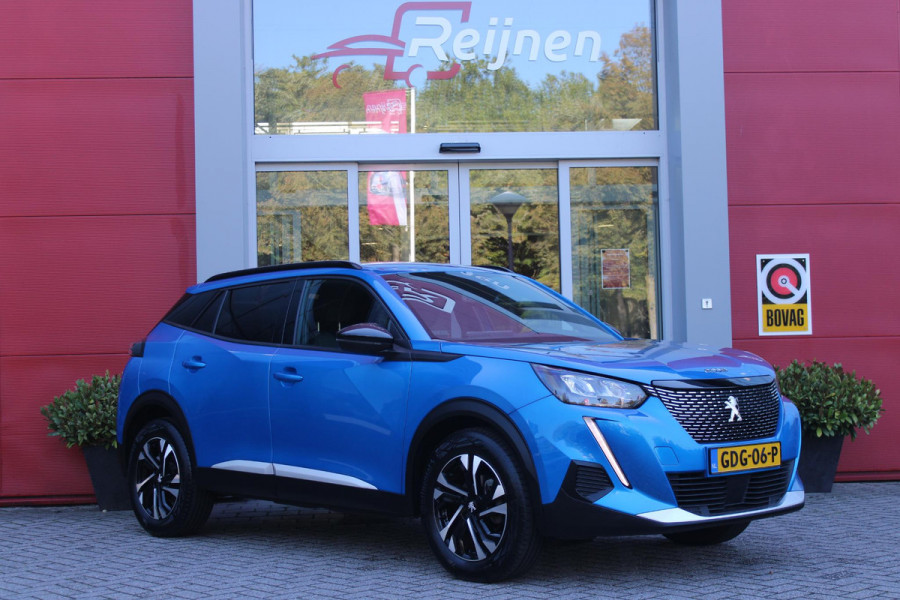 Peugeot 2008 1.2 130PK ALLURE PACK | TREKHAAK AFNEEMBAAR | NAVIGATIE 10" TOUCHSCREEN | APPLE CARPLAY/ANDROID AUTO | ACHTERUITRIJ CAMERA | 3-D INSTRUMENTENPANEEL | CLIMATE CONTROL | CRUISE CONTROL | KEYLESS ENTRY / START | 17" LICHTMETALEN VELGEN |