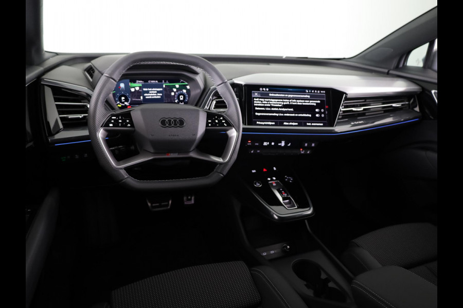 Audi Q4 e-tron 45 S edition Competition e-tron 82 kWh 286 pk | Navigatie | Stoelverwarming | Assistentiepakket plus | Comfortpakket | Ambient lichtpakket | Optiekpakket zwart plus | 20 inch Lichtmetalen velgen