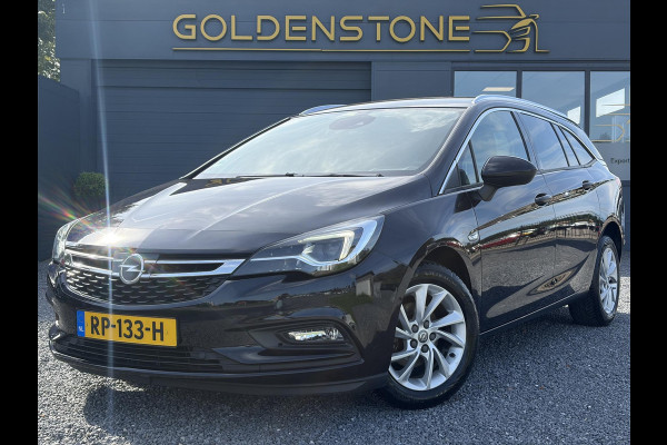 Opel Astra Sports Tourer 1.4 Business Executive ✓2 Eigenaar✓Camera✓Navi✓Trekhaakt✓Carplay✓Stoelverw✓Stuurverw✓Automaat✓Dealer Onderhouden✓Keyless✓Clima✓Cruise✓Pdc V+A✓Halfleder✓Comfortstoelen✓150pk✓Rijstrooksensor✓Dodehoeksensor✓Elekt Stoelen✓Lm velgen✓N.A.P✓Apk tot 03-2027