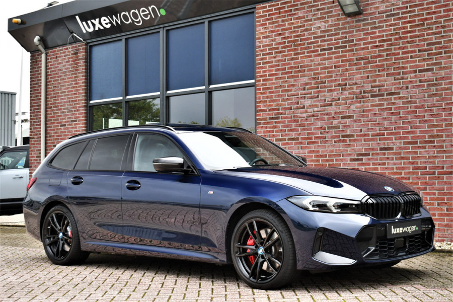 BMW 3 Serie Touring 330e xDrive M-Sport Pro Pano DA-Prof 360 HUD H/K E-zetels 19inch