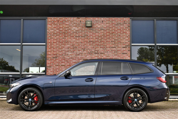 BMW 3 Serie Touring 330e xDrive M-Sport Pro Pano DA-Prof 360 HUD H/K E-zetels 19inch